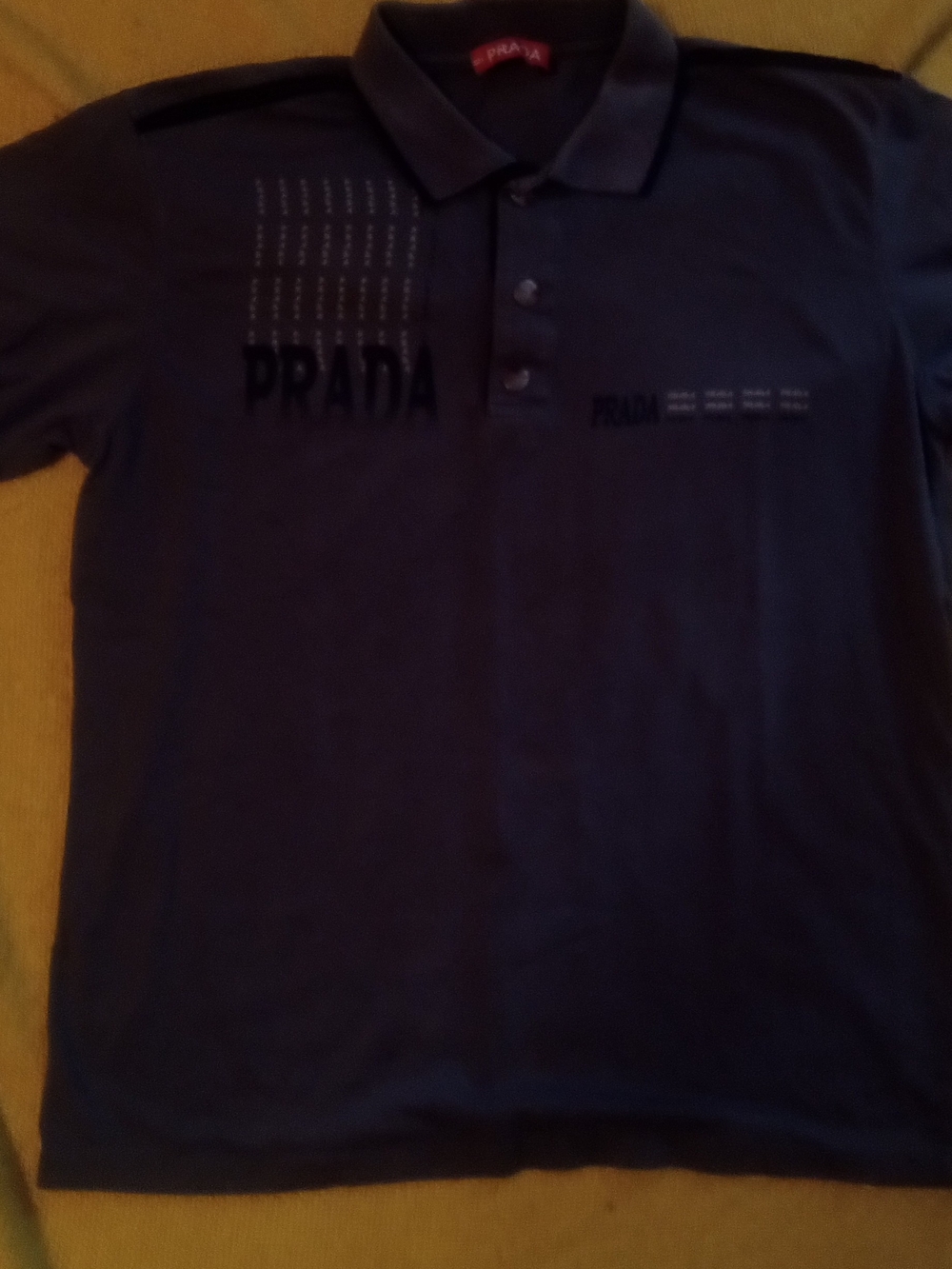 Prada Men's Polo in Navy Blue with Tone-on-Tone Logo
